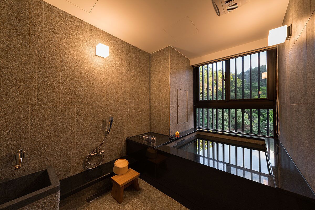 spring water bathtub, rainfall showerhead, hair dryer, bathrobes