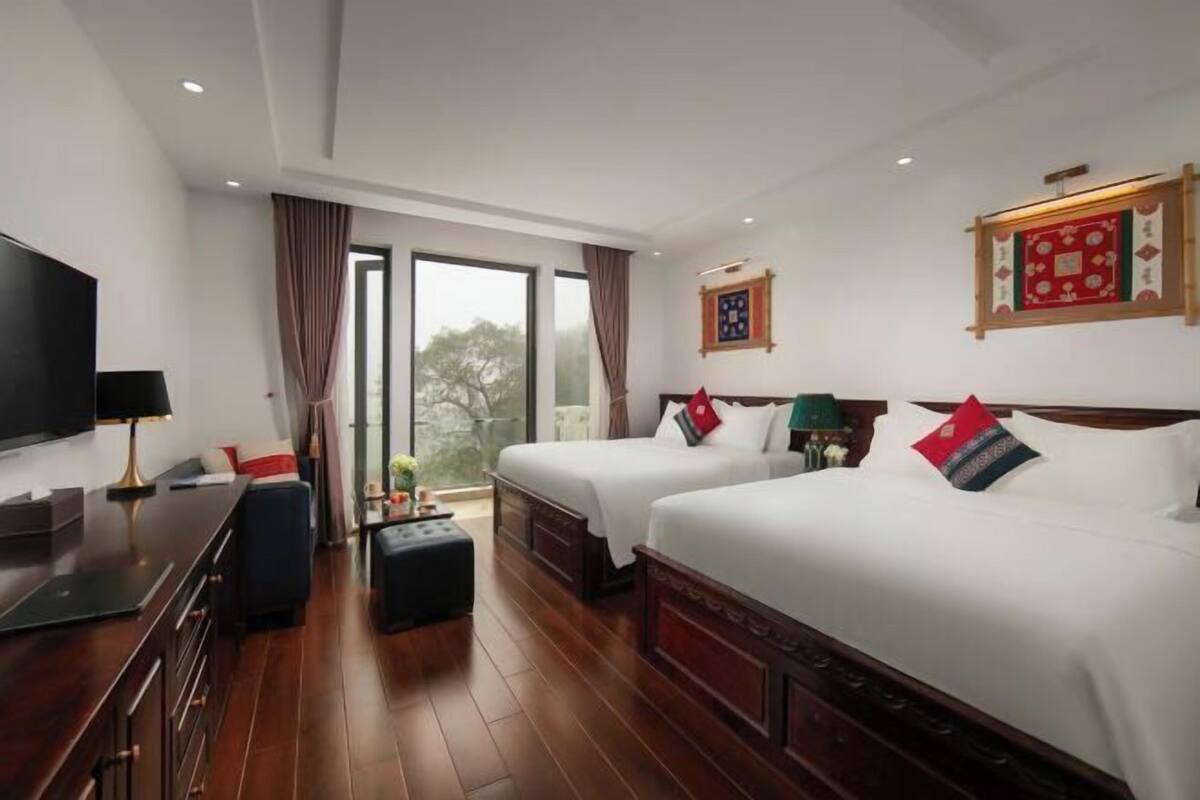 Luxe beddengoed, een minibar, een kluis op de kamer, een bureau