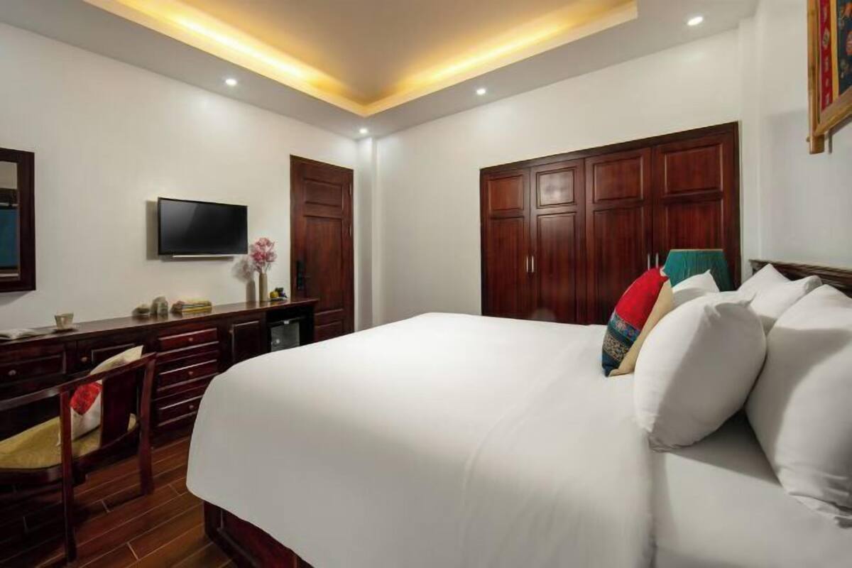 Luxe beddengoed, een minibar, een kluis op de kamer, een bureau