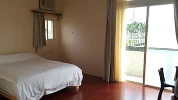 Desk, blackout drapes, bed sheets
