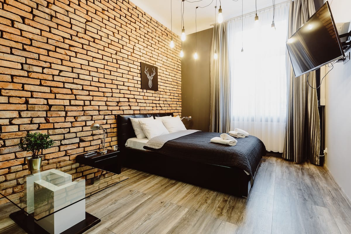 Departamento Deluxe, 1 cama Queen size y sofá cama, hidromasaje | Tabla de planchar con plancha, cunas y wifi gratis