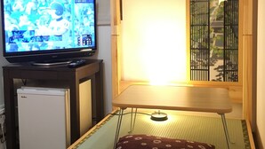 スタンダード シングルル  ーム 1 ベッドルーム | リビング エリア | LED テレビ