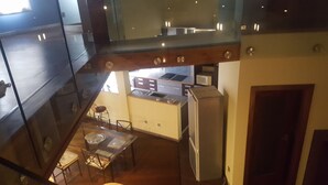 Comfort Apartment, 2 Bedrooms, Mezzanine | Living area | Flat-screen TV