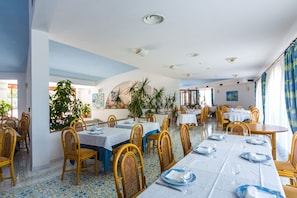 Breakfast, lunch, dinner served; local cuisine, garden views