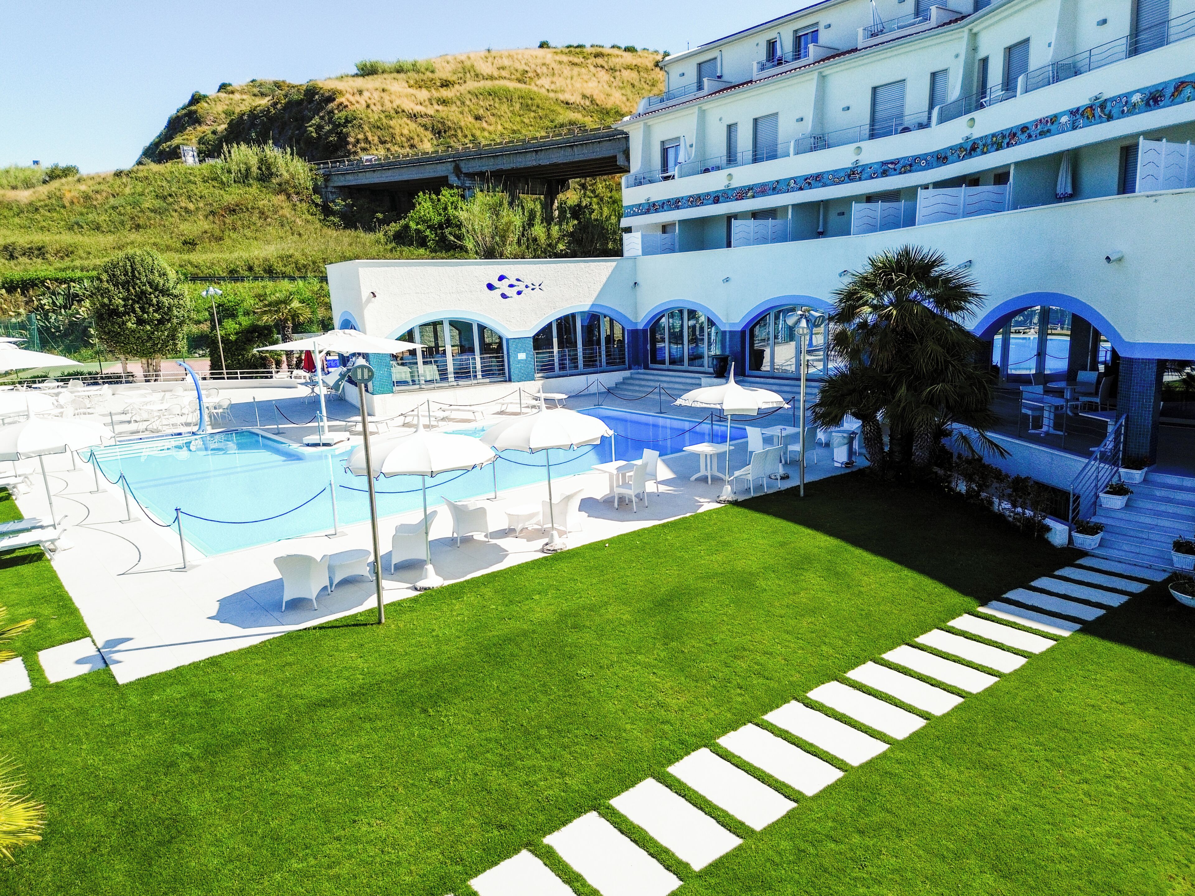 Seasonal outdoor pool, pool umbrellas, sun loungers