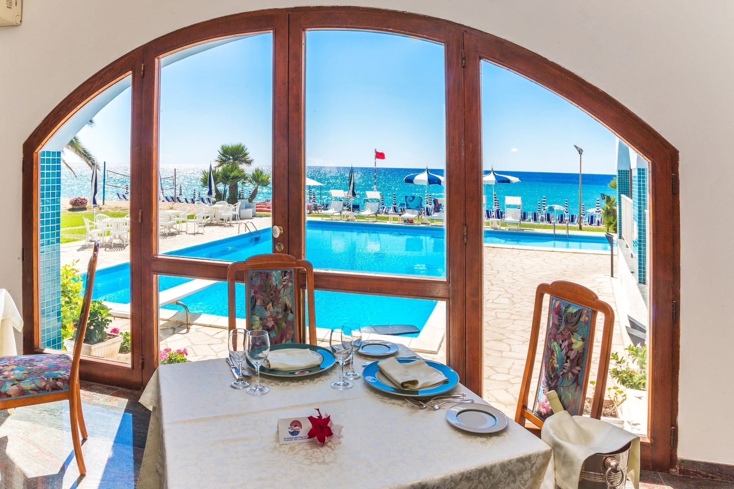 Breakfast, lunch, dinner served; local cuisine, pool views 