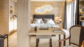 Suite, 1 cama King size | Ropa de cama de alta calidad y minibar