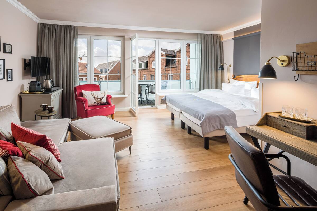 Chambre Double Deluxe, balcon | Coin séjour