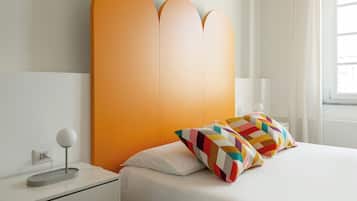 Premium bedding, laptop workspace, blackout curtains, soundproofing