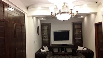 Executive Suite | Living area | LED TV