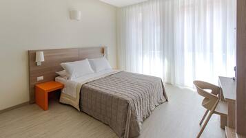 Superior Double or Twin Room, Private Bathroom, City View | Minibar, in-room safe, desk, iron/ironing board
