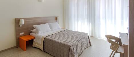 Superior Double or Twin Room, Private Bathroom, City View | Minibar, in-room safe, desk, iron/ironing board