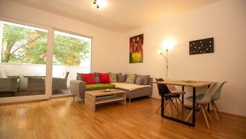 Comfort Apartment, Multiple Beds, Non Smoking, Balcony (Top 3) | Living area | 45-inch flat-screen TV with satellite channels, LED TV, Netflix