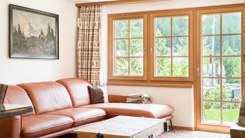 Family Chalet, 2 Bedrooms, Mountain View | Living area | Flat-screen TV, fireplace, DVD player