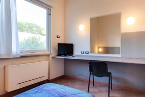 Quarto casal de uso individual | Escrivaninha, Wi-Fi de cortesia