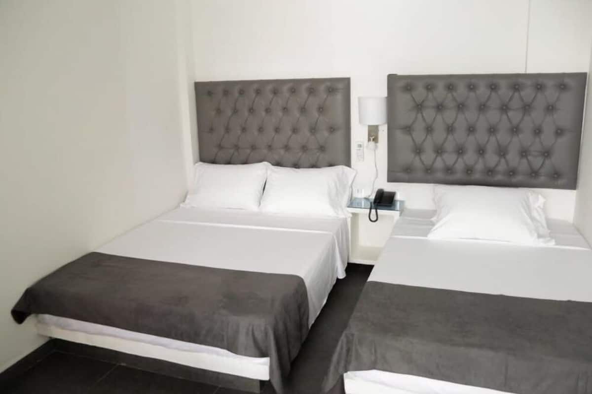 Family Room, 2 Double Beds | Free WiFi