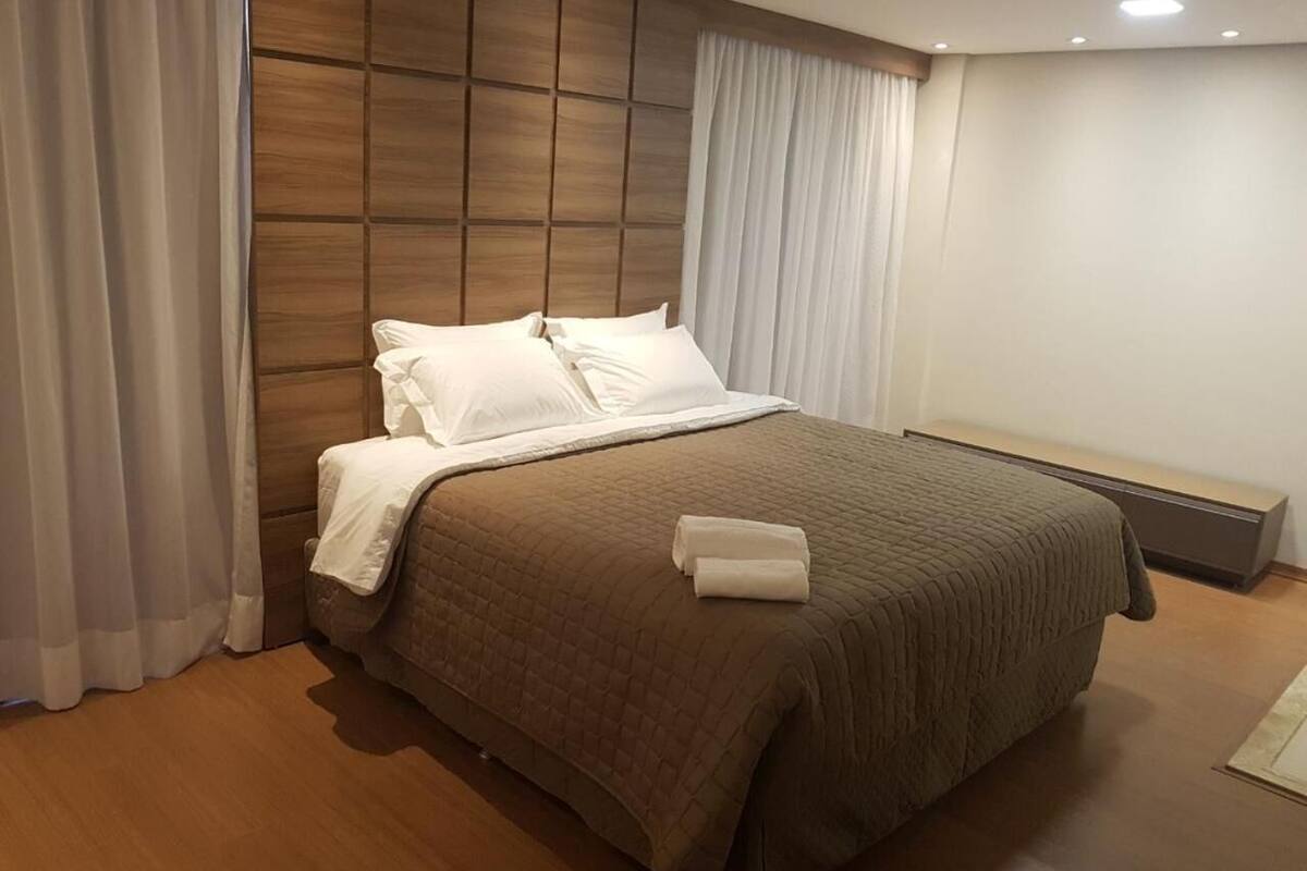 minibar, desk, laptop workspace, blackout curtains