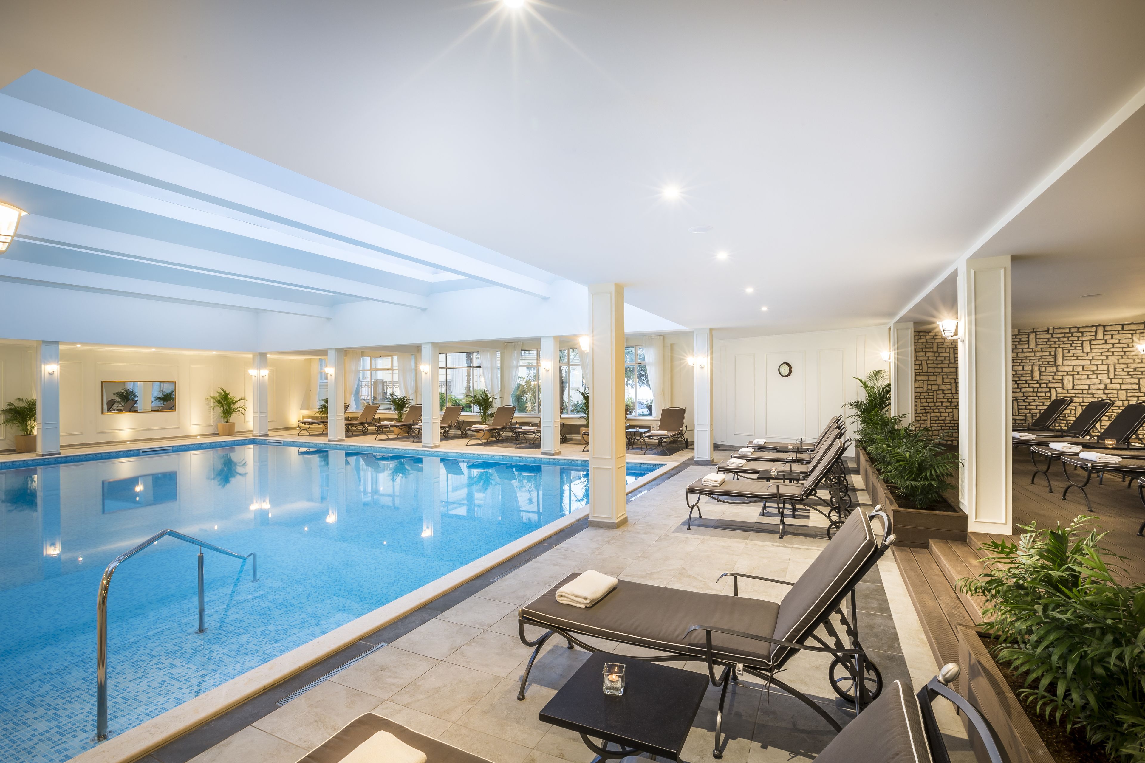 indoor pool, open 8:00 am to 8:00 pm, pool loungers