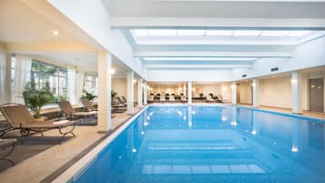 Indoor pool, open 8:00 AM to 8:00 PM, pool loungers