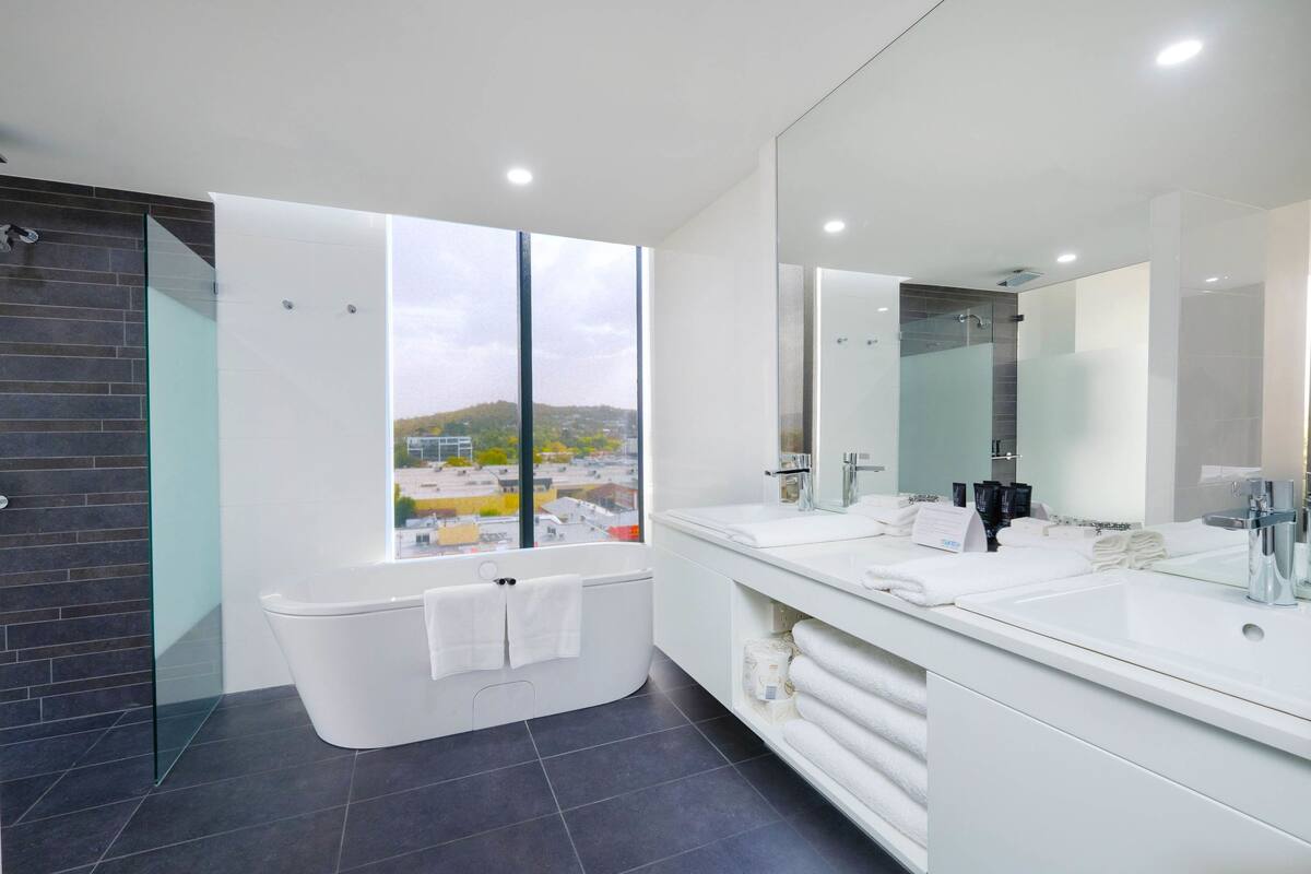 shower, eco-friendly toiletries, hair dryer, towels