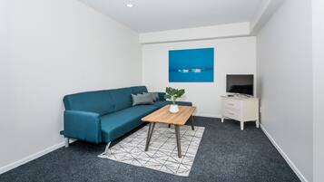 Comfort House, 3 Bedrooms | Living area | Flat-screen TV