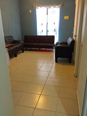 Comfort Studio | Living area | Flat-screen TV