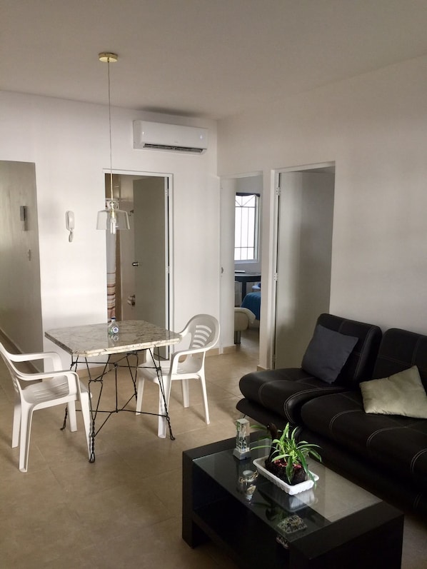 Comfort Apartment, Multiple Beds | Living area | Flat-screen TV