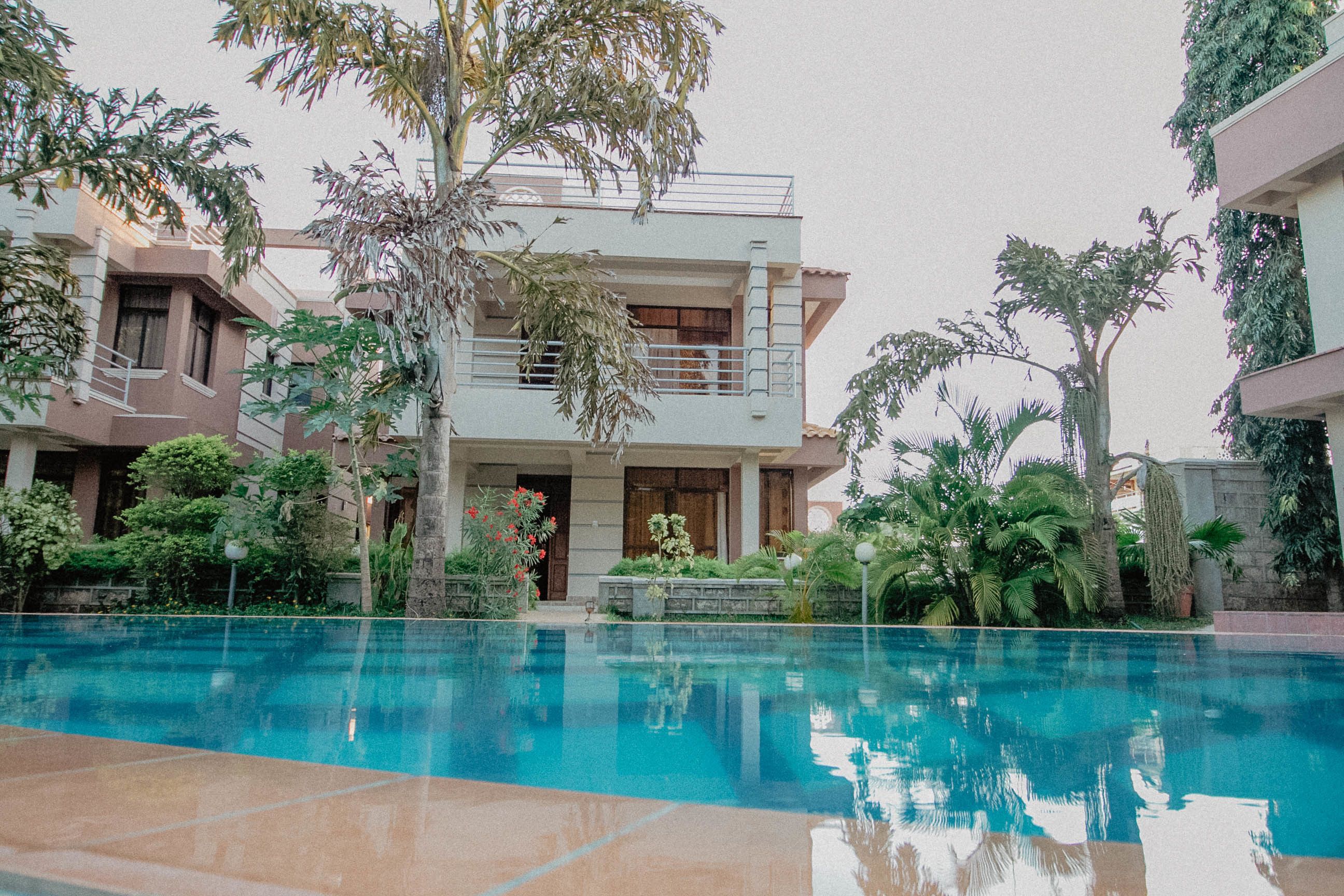 Outdoor pool, open 6:00 AM to 7:00 PM, pool umbrellas, pool loungers