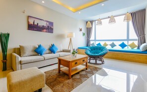 Condo, 3 Bedrooms | Living room | Flat-screen TV - Premium Beach Hotels & Apartments (Ho Chi Minh City)