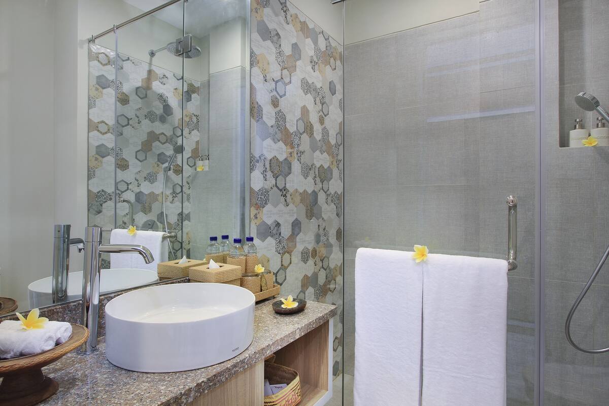 free toiletries, hair dryer, slippers, towels