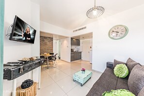 Deluxe appartement, 1 slaapkamer | 1 slaapkamer, gratis babybedden, gratis kabelinternet