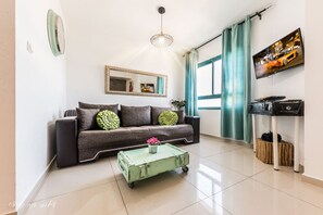 Deluxe appartement, 1 slaapkamer | 1 slaapkamer, gratis babybedden, gratis kabelinternet