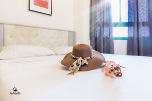 Apartamento conforto, 2 quartos | 2 quartos, escrivaninha, ferros/tábuas de passar roupa, berços grátis