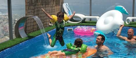 Outdoor pool, pool umbrellas, pool loungers