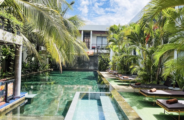 Outdoor pool, pool umbrellas, pool loungers