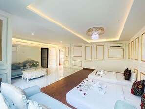 Habitación familiar | 1 dormitorio, edredones de plumas, minibar y caja fuerte