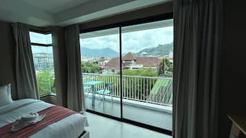 Deluxe Twin Room, Mountain View | 1 bedroom, in-room safe, blackout curtains, free WiFi