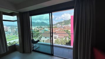 Deluxe Double Room, Mountain View | 1 bedroom, in-room safe, blackout drapes, free WiFi