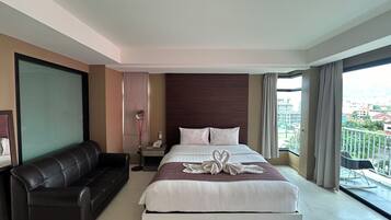 Deluxe Double Room, Mountain View | 1 bedroom, in-room safe, blackout curtains, free WiFi