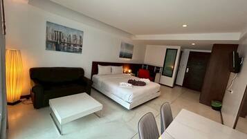 Habitación Deluxe doble | 1 dormitorio, caja fuerte, cortinas opacas y wifi gratis