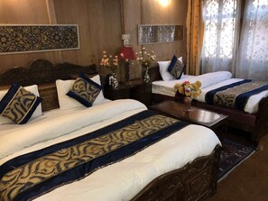 Premium bedding, desk, iron/ironing board, rollaway beds