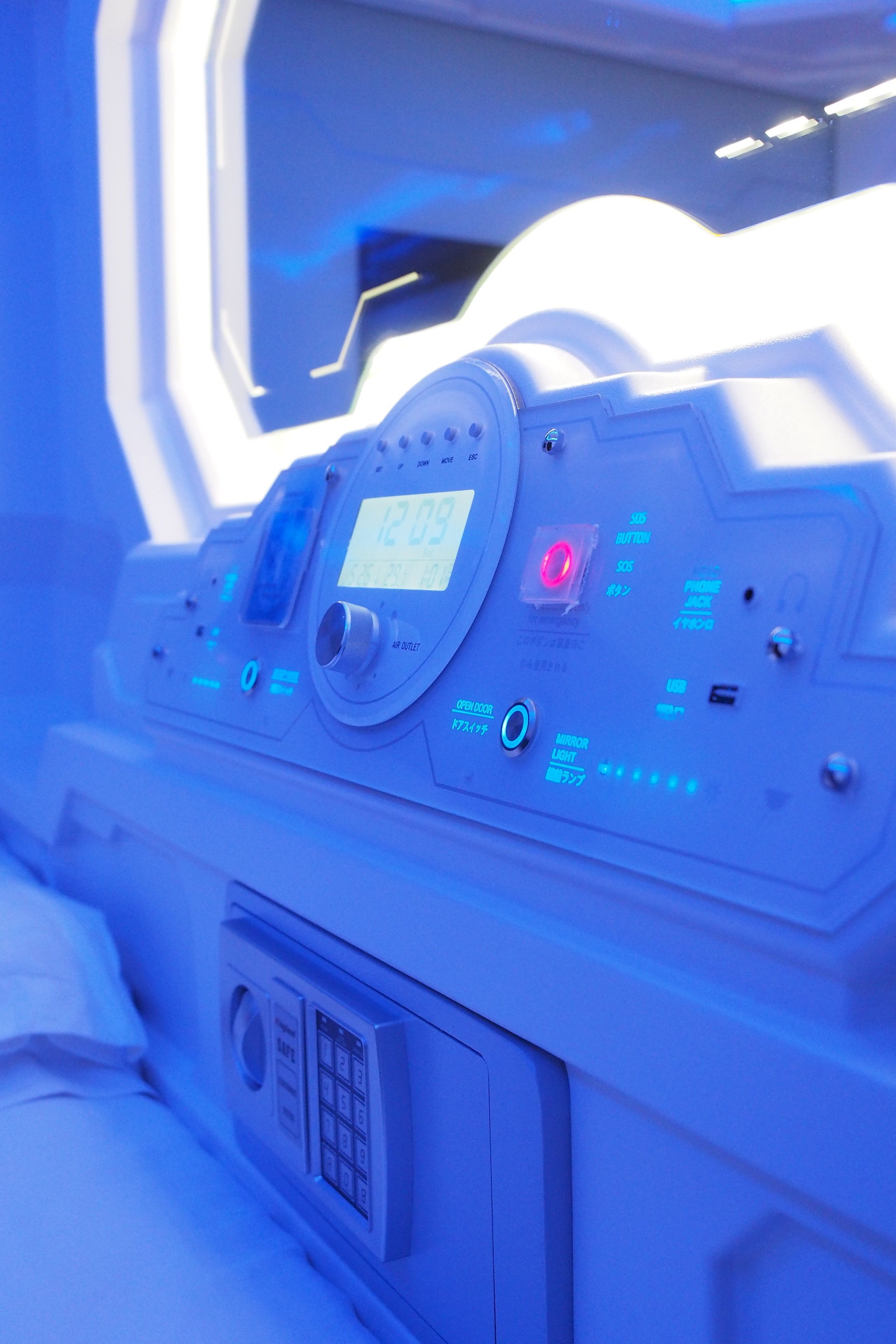 A control panel with digital displays and buttons, likely for operating a medical or technical device.