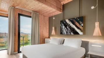Junior Suite, 1 King Bed, River View | 1 bedroom, minibar, in-room safe, desk