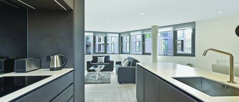 Deluxe Apartment, 2 Bedrooms | Private kitchen | Full-size fridge, microwave, oven, stovetop