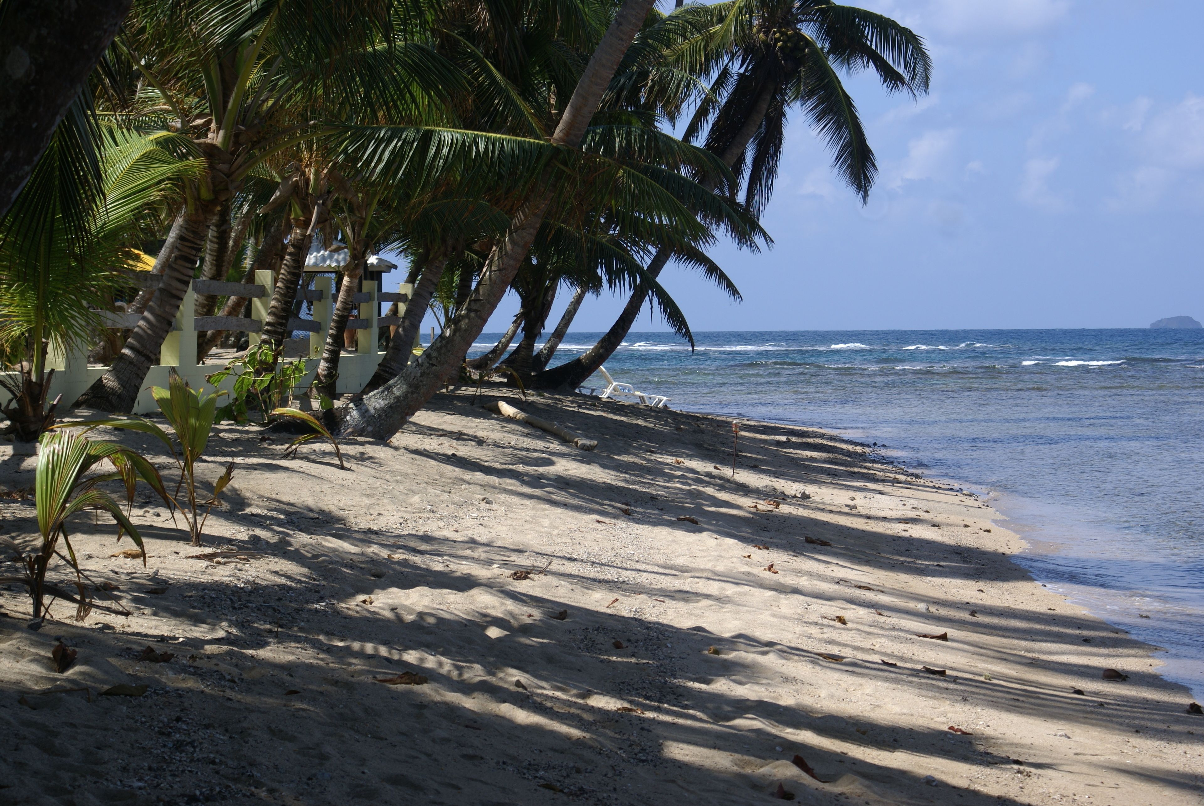 on the beach, sun-loungers, beach towels