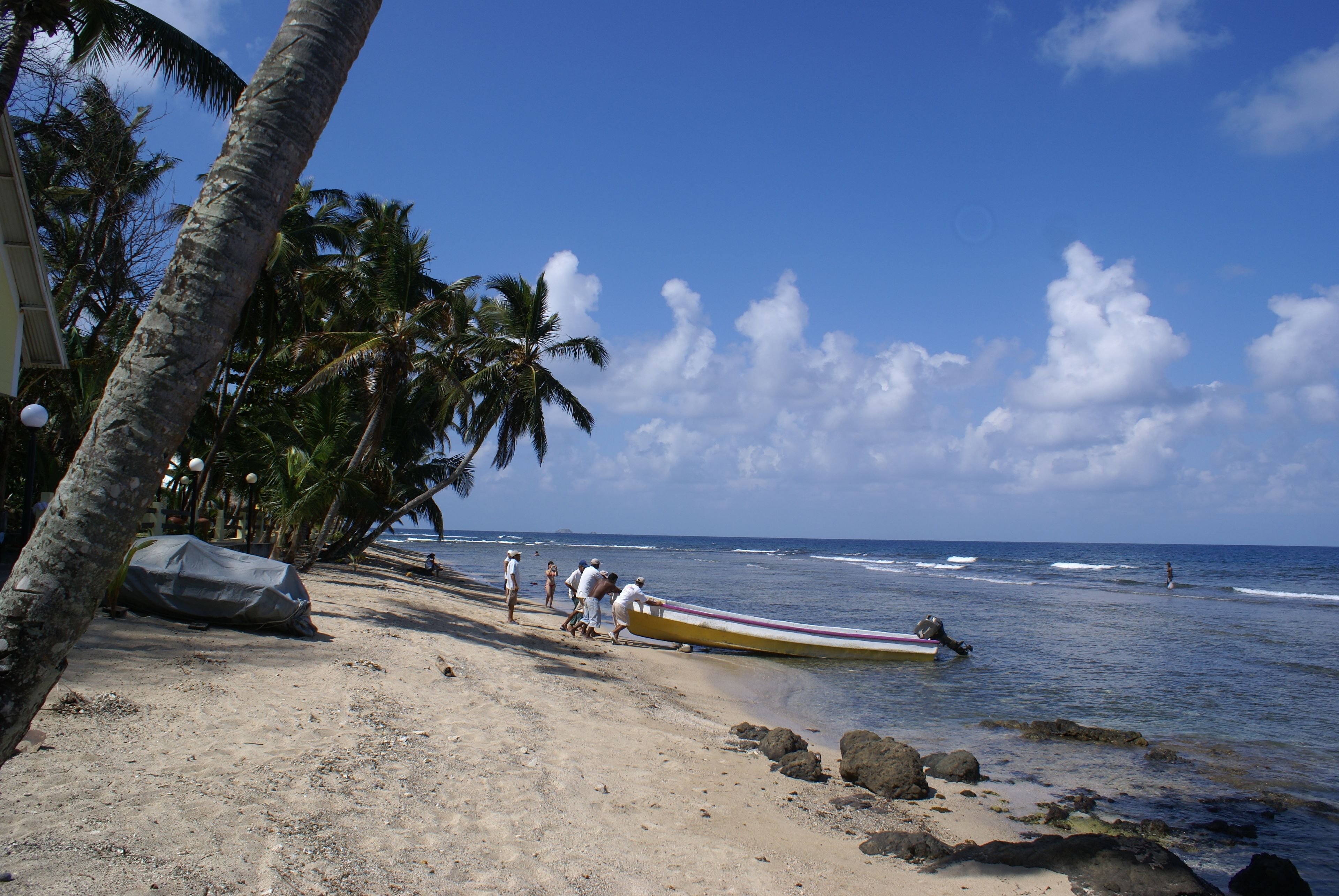 on the beach, sun-loungers, beach towels
