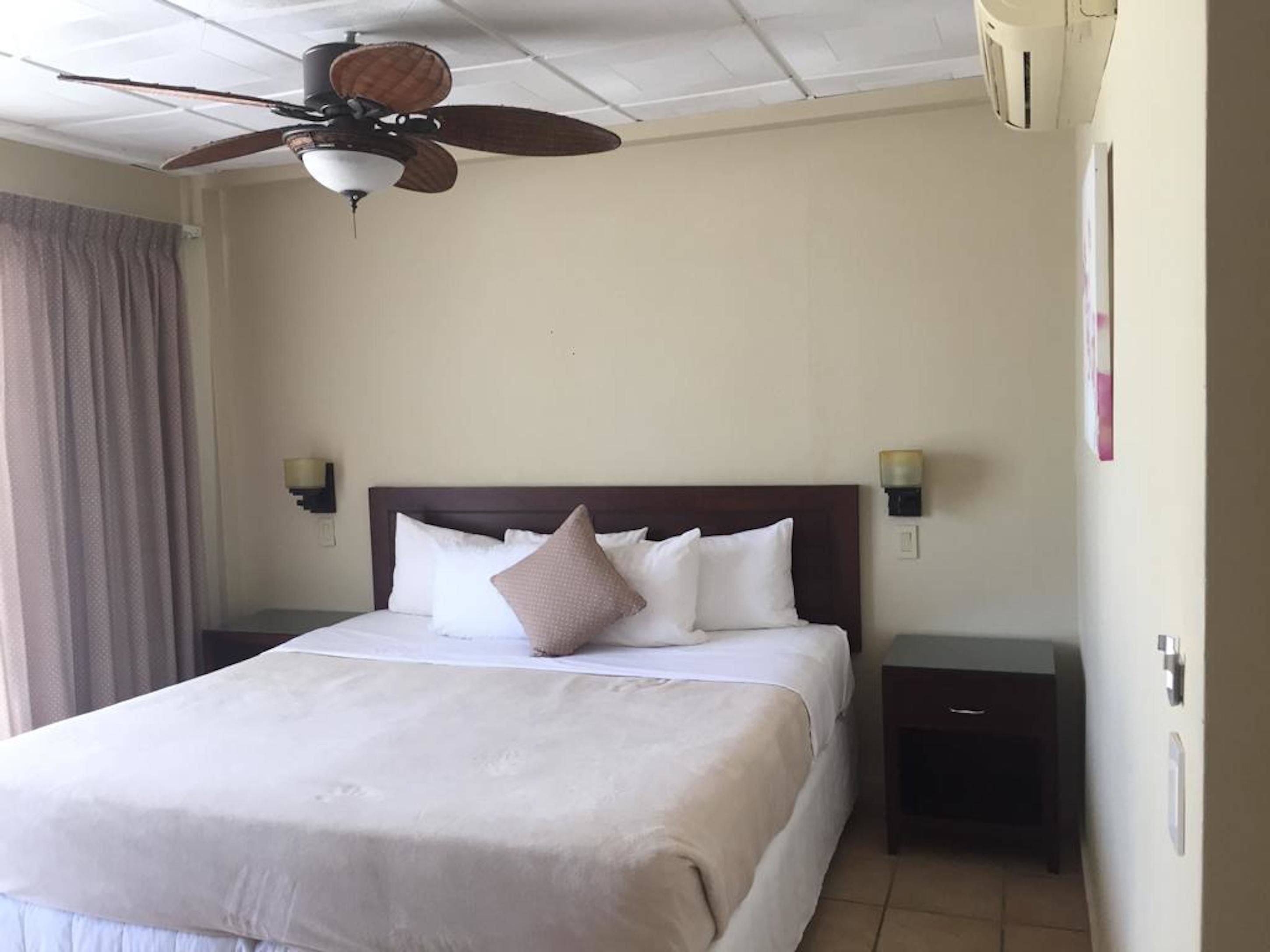 room, 1 king bed | in-room safe, iron/ironing board, free cots/infant beds, bed sheets