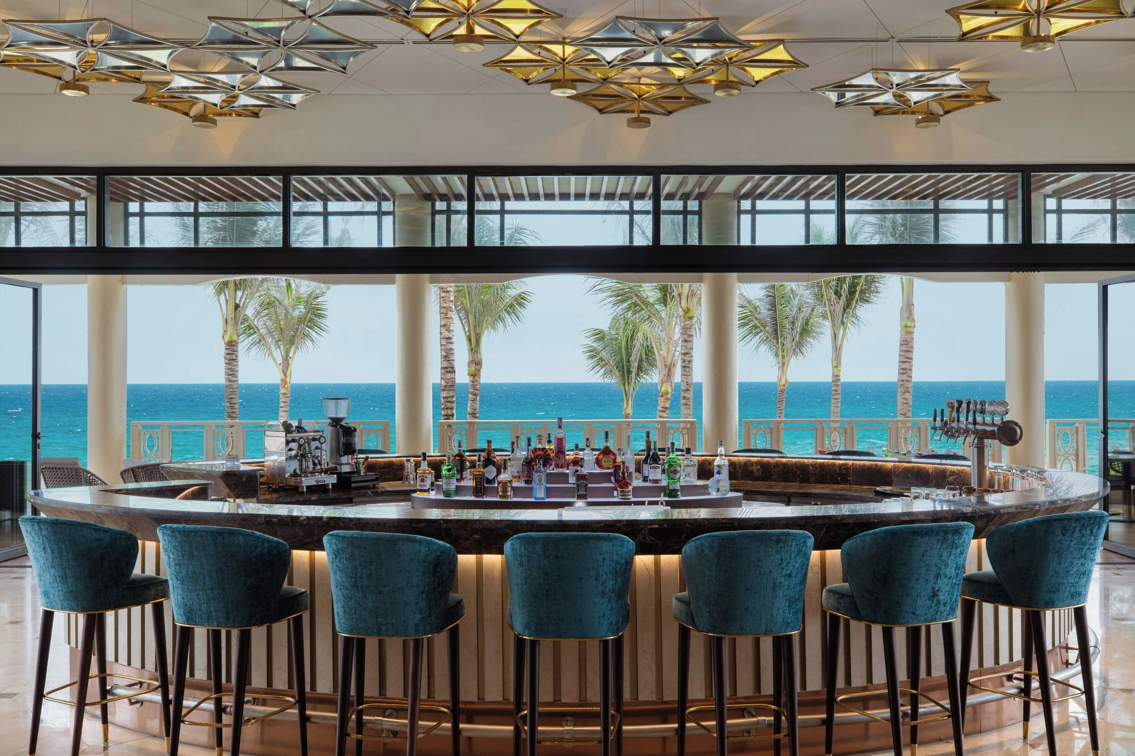 3 bars/lounges, poolside bar, beach bar