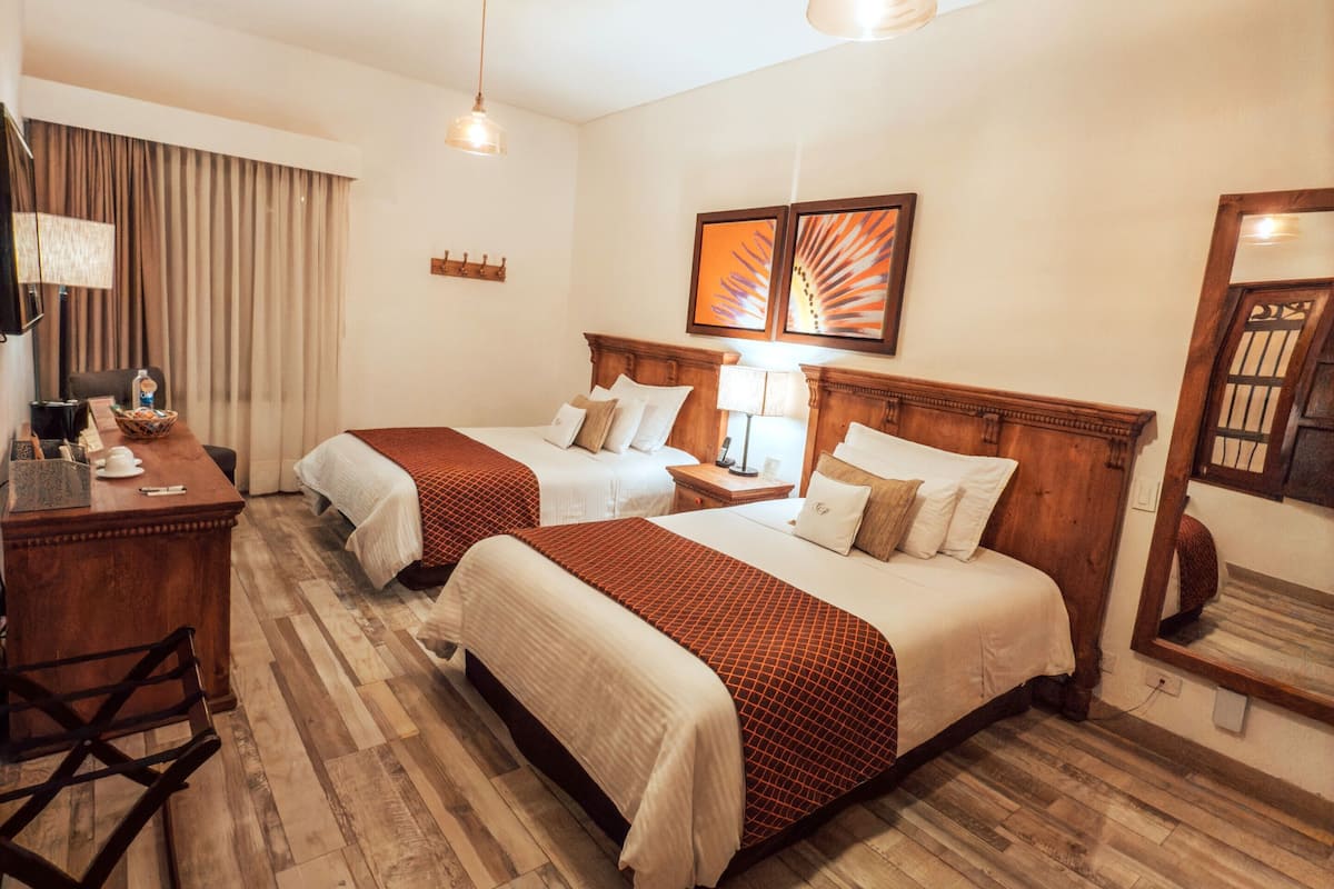 Quadruple Room, 2 Double Beds | In-room safe, desk, iron/ironing board, free cots/infant beds