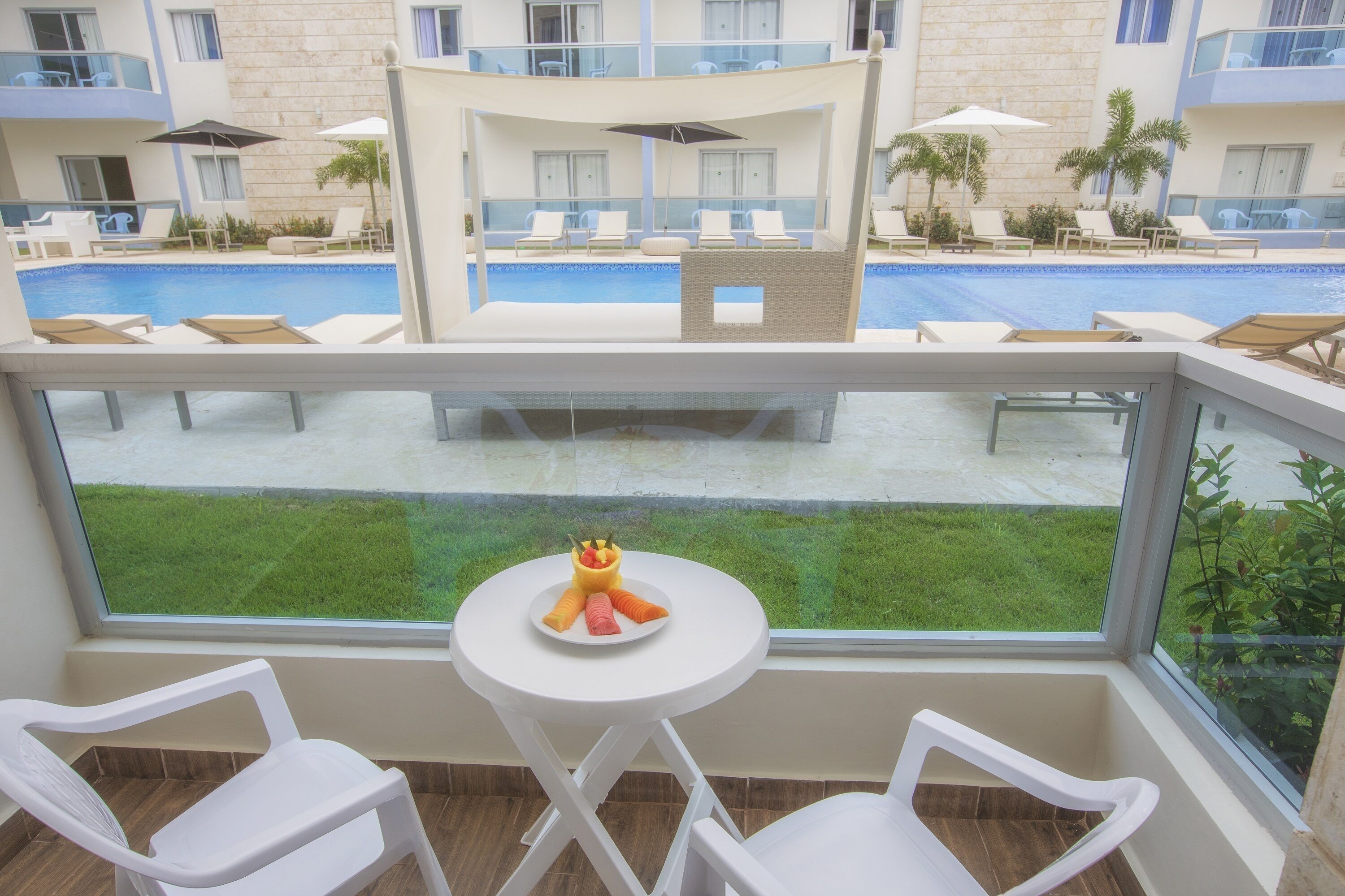 studio with pool view | balcony view